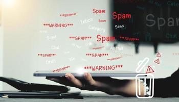 Concept of e-mail and computer viruses. Review the concepts of internet security, spam and e-marketing on screen. Spam email pop-up warnings. photo