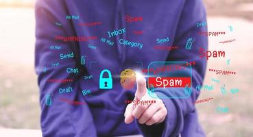 Concept of e-mail and computer viruses. Review the concepts of internet security, spam and e-marketing on screen. Spam email pop-up warnings. photo