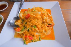 Stir-fried crab meat with curry powder, Thai food. photo