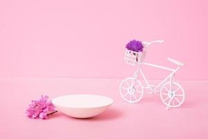 Podium or pedestal with chrysanthemum flowers. Mockup for your cosmetic products photo