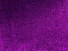 Purple velvet fabric texture used as background. Empty purple fabric background of soft and smooth textile material. There is space for text. photo