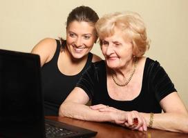 Senior lady on the computer photo