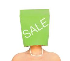 It's on sale now. Woman with shopping bag on the head photo