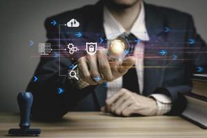 businessman working with business Analytics and Data Management System on virtual screen, online document management and metrics connected to database. Corporate strategy for finance, operations photo