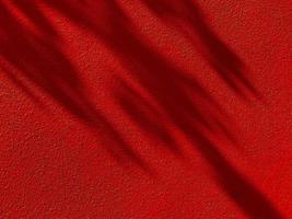 Abstract Shadow. blur background. gray leaves that reflect concrete walls on a red wall surface for blurred backgrounds photo