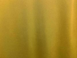 Yellow cotton fabric texture used as background. Empty yellow fabric background of soft and smooth textile material. There is space for text.. photo