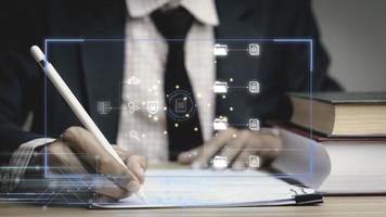 businessman working with business Analytics and Data Management System on document, online document management and metrics connected to database. Corporate strategy for finance, operations, sales. photo