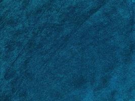 textura de tela de terciopelo azul claro utilizada como fondo. fondo de tela azul claro vacío de material textil suave y liso. hay espacio para el texto... foto