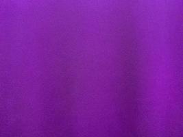 Purple cotton fabric texture used as background. Purple fabric background of soft and smooth textile material. There is space for text.. photo