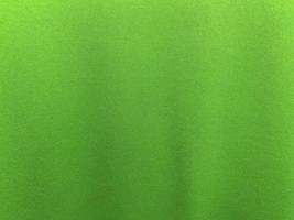 Green cotton fabric texture used as background. Empty green fabric background of soft and smooth textile material. There is space for text.. photo
