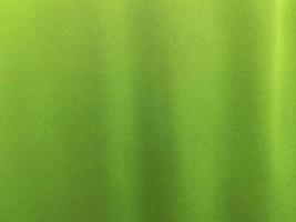 Green cotton fabric texture used as background. Empty green fabric background of soft and smooth textile material. There is space for text.. photo