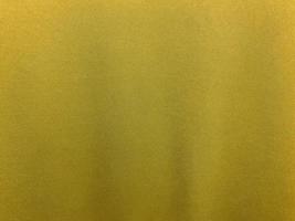 Yellow cotton fabric texture used as background. Empty yellow fabric background of soft and smooth textile material. There is space for text.. photo