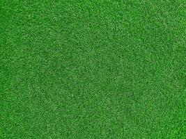 Green grass texture background grass garden top view. Concept used for making green background football pitch, Grass Golf,  green lawn pattern textured background. photo
