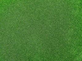 Green grass texture background grass garden top view. Concept used for making green background football pitch, Grass Golf,  green lawn pattern textured background. photo