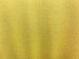 Yellow cotton fabric texture used as background. Empty yellow fabric background of soft and smooth textile material. There is space for text.. photo