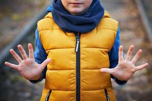 Picture of a child with a lot of love and peaceful message photo