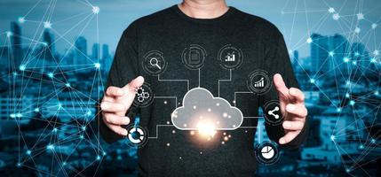 man holding cloud computing diagram show on hand. Data storage.Cloud technology.Secure backup and consistency Networking and internet service concept.Implementing storage technology in business photo