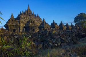 Candi Plaosan, a Buddhist temple located in Klaten Central Java, Indonesia, with a background of Mount Merapi photo