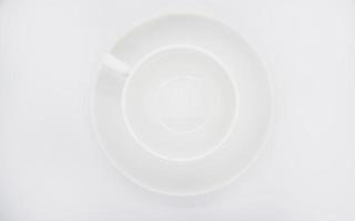 Tea couple on a white background. Porcelain service close-up. A teacup and saucer. photo