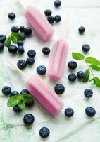 Homemade blueberry ice cream or popsicles photo