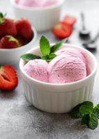 Homemade strawberry  ice cream with fresh strawberries photo