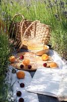 Summer picnic on a lavender field photo