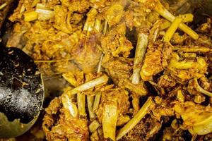 tengkleng kambing or goat tengkleng is a kind of soup with the main ingredient of goat bones. tengkleng like curry with goat bone material photo