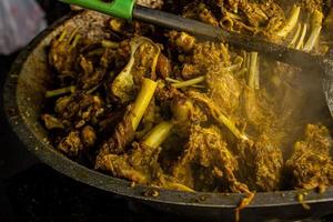 tengkleng kambing or goat tengkleng is a kind of soup with the main ingredient of goat bones. tengkleng like curry with goat bone material photo