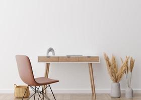 Empty white wall in modern home office. Mock up interior in scandinavian, boho style. Free space, copy space for your picture, poster. Desk, chair, pampas grass, rattan basket. 3D rendering. photo