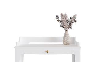 White table with pampas grass isolated on white background. Front view. Cut out furniture. Modern desk. Interior design element. Copy space for your object, product presentation. 3D rendering. photo