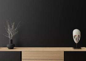 Empty black wall. Mock up interior in contemporary style. Close up view. Free space, copy space for your picture, text, or another design. Sideboard, vase, sculpture. 3D rendering. photo
