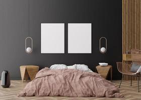 Two empty vertical picture frames on black wall in modern bedroom. Mock up interior in contemporary style. Free space for picture, poster. Bed, parquet, lamps, vase, rattan armchair. 3D rendering. photo