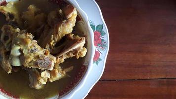 tengkleng kambing or goat tengkleng is a kind of soup with the main ingredient of goat bones. photo