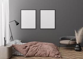 Two empty vertical picture frames on gray wall in modern bedroom. Mock up interior in contemporary style. Free space for picture, poster. Bed, parquet, armchair, lamp, pampas grass. 3D rendering. photo