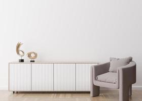 Empty white wall in modern living room. Mock up interior in contemporary style. Free space, copy space for your picture, text, or another design. Sideboard, armchair, sculptures. 3D rendering. photo