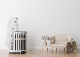 Empty white wall in modern child room. Mock up interior in scandinavian style. Free, copy space for your picture, poster. Baby bed, armchair. Cozy room for kids. 3D rendering. photo