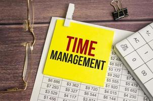 time management Text on business paper on office table photo
