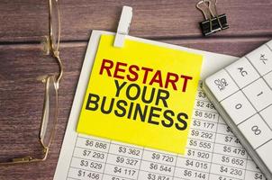 restart your business Text on business paper on office table photo