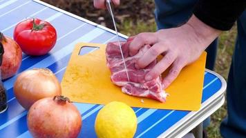 Slicing meat fo BBQ video