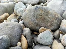 natural stone from the river with a hard texture good for building materials photo