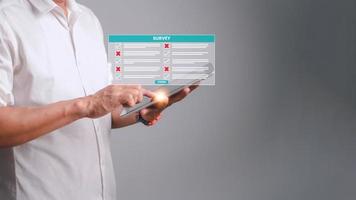 Survey form concept. Check marks on checklist and Filling online form or answering questions. Customer Experiences and satisfaction concept. photo