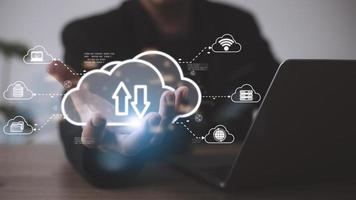 Man with cloud computing diagram show on hand. Cloud technology. Data storage. Networking and internet service concept. photo