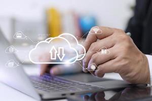 Cloud computing concept - connect to cloud. Businessman or information technologist click on cloud computing icon. photo