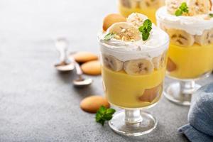 Banana pudding in small glasses photo