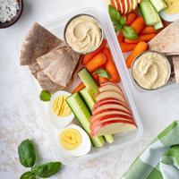Healthy and nutricious lunch or snack boxes photo