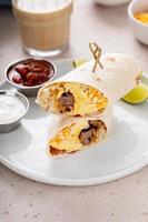 Breakfast burrito with sausage, eggs, hashbrown and cheese photo