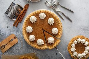 Homemade sweet potato pie with whipped cream photo