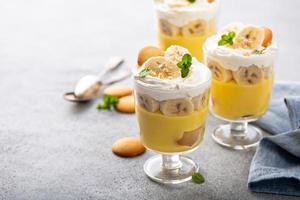 Banana pudding in small glasses photo