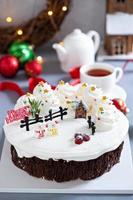 Christmas cake decorated with winter scene photo