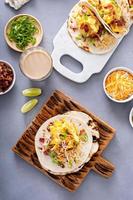 Breakfast tacos with hashbrowns, eggs and bacon photo